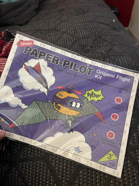 Original buyer photo of the paper airplane kit