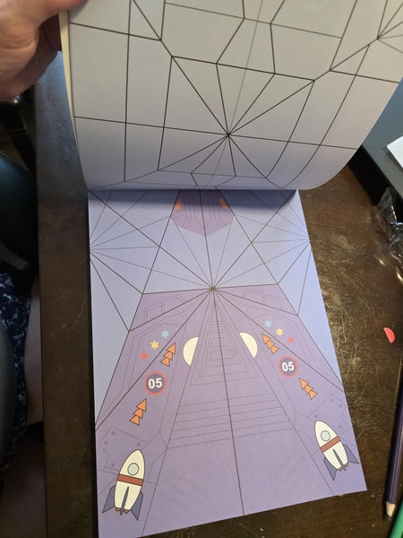 Original buyer photo of the paper airplane kit