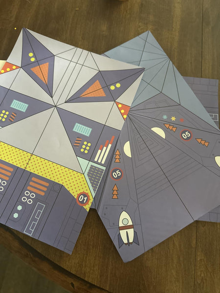 Original buyer photo of the paper airplane kit