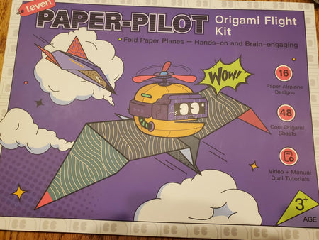 Original buyer photo of the paper airplane kit