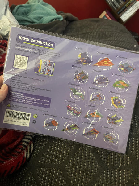 Original buyer photo of the paper airplane kit