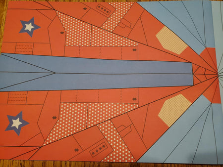 Original buyer photo of the paper airplane kit