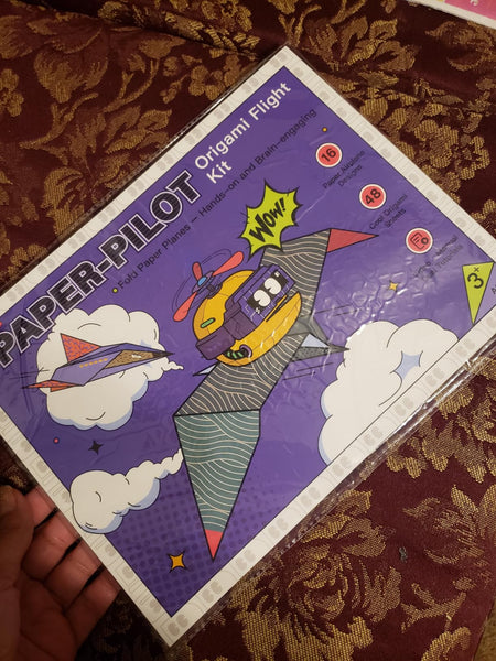 Original buyer photo of the paper airplane kit